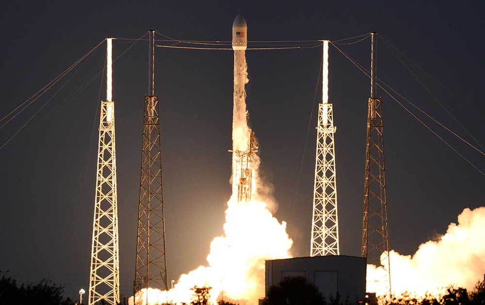 A SpaceX Falcon 9 rocket lifts off from Cape Canaveral Air Force station Friday, March 3, 2016. The rocket is carrying the SES-9 communications satellite.