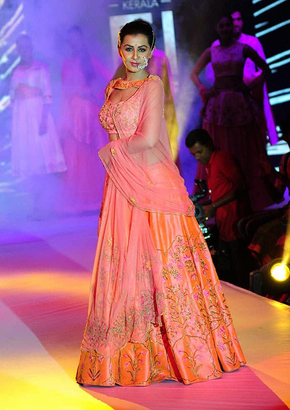 Actor Nikki Galrani walks the ramp during Kerala Fashion League in Kochi.