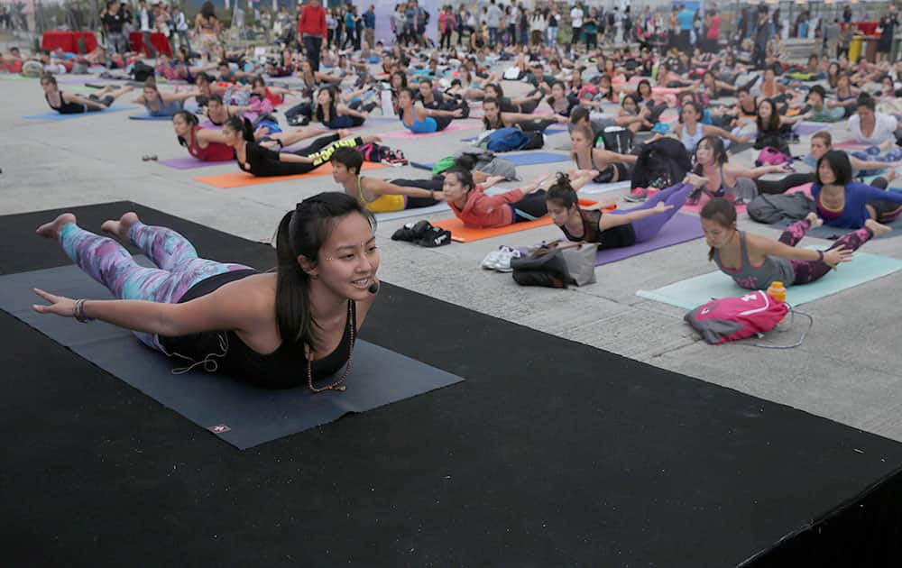 Participants take part in a yoga class in Hong Kong.