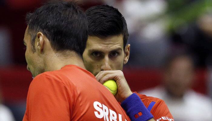 Davis Cup: Novak Djokovic tastes first defeat in five years; Italy beat Switzerland to make quarters