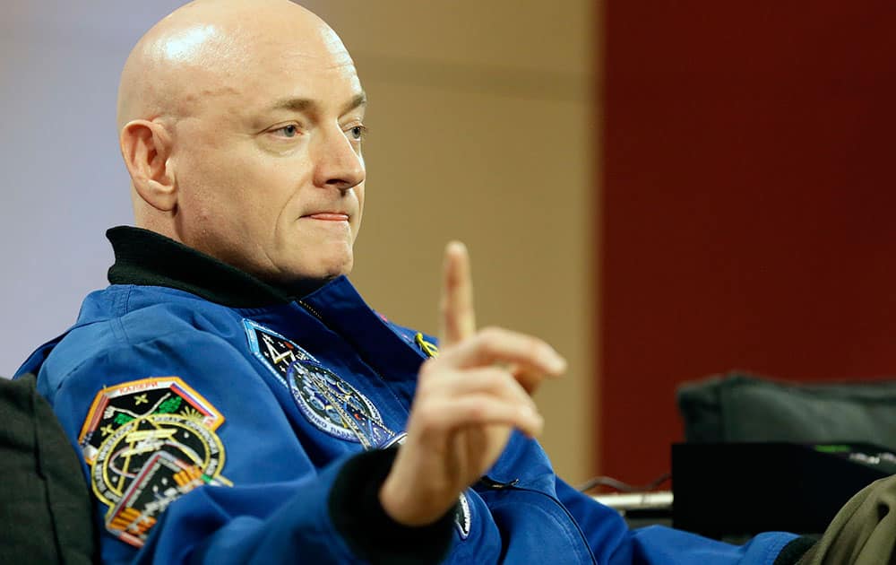 NASA astronaut Scott Kelly speaks during a press conference, in Houston. Kelly set a U.S. record with his 340-day mission to the International Space Station.