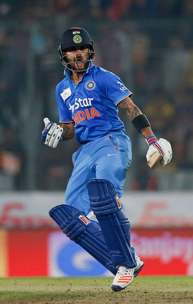 India’s Virat Kohli celebrates after winning the Asia Cup Twenty20 international cricket final match against Bangladesh in Dhaka, Bangladesh.