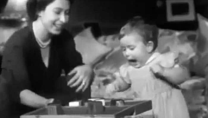 Rare video: Doting mother Queen Elizabeth with one-year-old Prince Charles