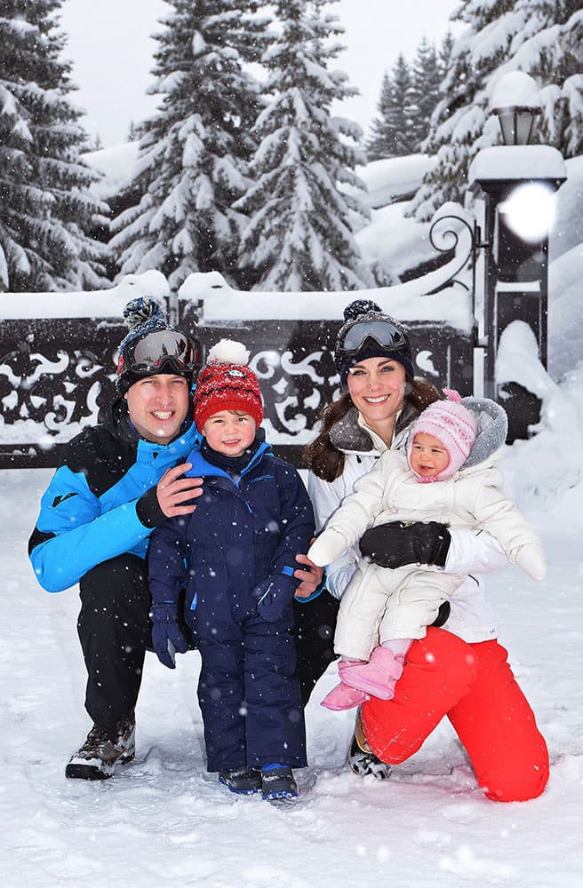 Britain's Prince William and Duchess of Cambridge with their children, Princess Charlotte, right, and Prince George, enjoy a short private break skiing in the French Alps.