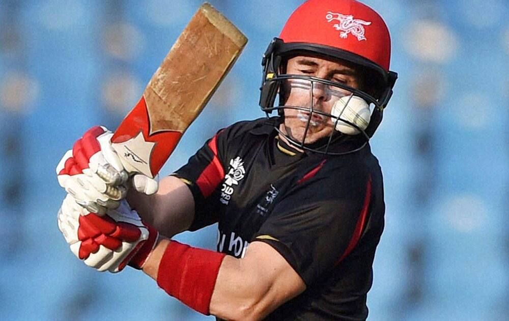 A ball gets stuck in the helmet of Hong Kong batsman Ryan Campbell during the ICC World Twenty20 2016 cricket tournament against Zimbabwe at the Vidarbha Cricket Association Stadium in Nagpur.