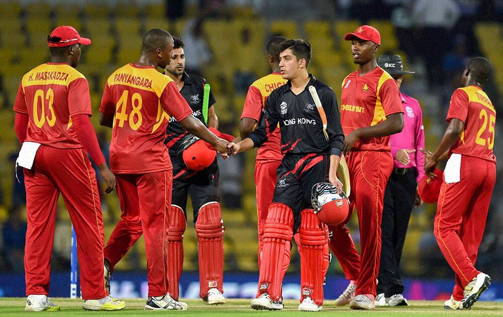 Zimbabve's Tinashe Panyangara greets Hong Kong's batsmen after Zimbabve won the ICC World Twenty20 2016 cricket tournament at the Vidarbha Cricket Association Stadium in Nagpur.