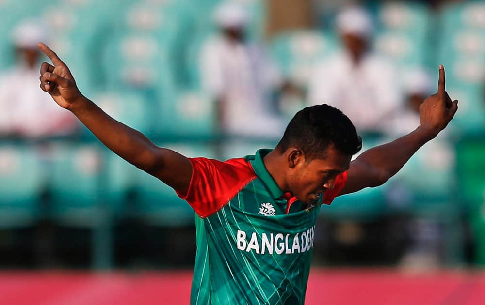 Bangladesh's Abu Hider Al-Amin Hossain celebrates the wicket of Netherlands's Wesley Barresi during the ICC World Twenty20 2016 cricket tournament at the Himachal Pradesh Cricket Association (HPCA) stadium in Dharmsala.