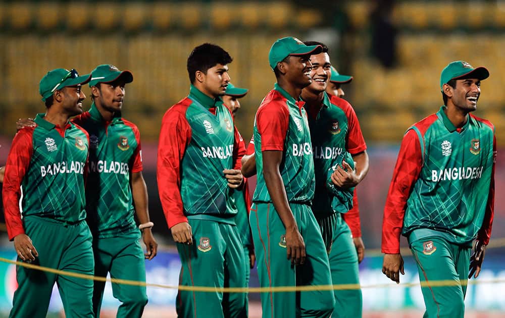 Bangladesh players leave the stadium after winning their first match against the Netherlands by 8 runs during the ICC World Twenty20 2016 cricket tournament at the Himachal Pradesh Cricket Association (HPCA) stadium in Dharmsala.
