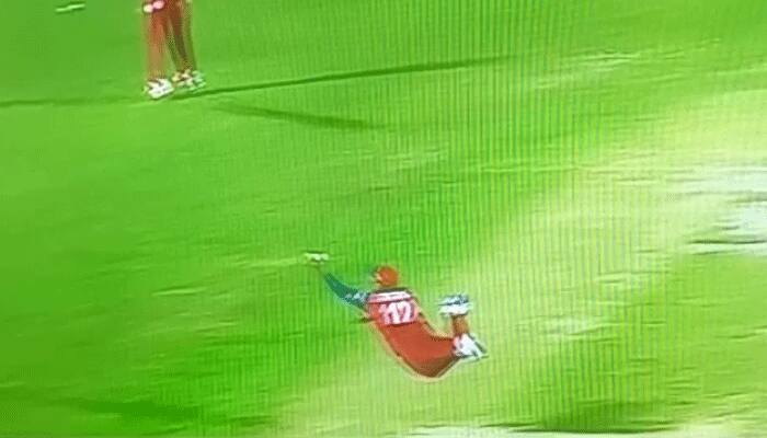 MUST WATCH VIDEO: Unbelievable catch by Oman&#039;s Zeeshab Maqsood against Ireland in ICC World Twenty20 qualifier