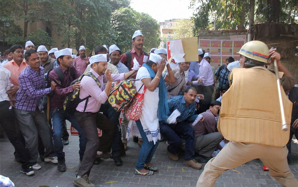 Police lathicharging computer teachers who were holding a protest demading service security in Lucknow.