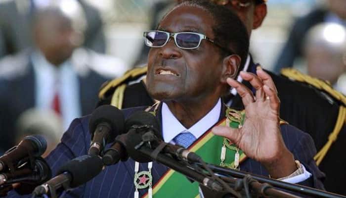 After Pranab Mukherjee, Zimbabwe President Robert Mugabe pulls out of Sri Sri&#039;s event