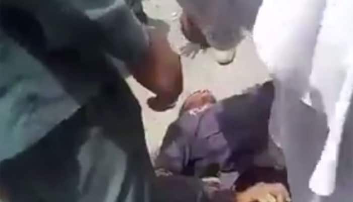 Gruesome video goes viral! Shows police dragging man behind truck in Afghanistan - Watch