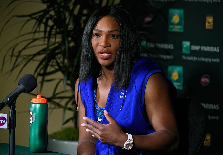 Serena Williams speaks during a news conference at the BNP Paribas Open tennis tournament, in Indian Wells, Calif.