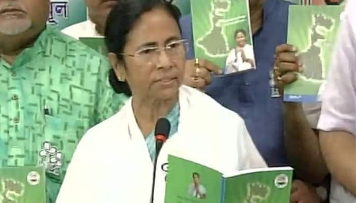 West Bengal polls 2016: Mamata Banerjee releases TMC&#039;s manifesto in five languages, hopes Singur farmers will get back their land 