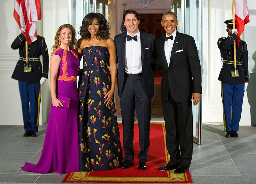President Barack Obama and first lady Michelle Obama pose for a photo with Canadian Prime Minister Justin Trudeau and Sophie Grégoire Trudeau at the North Portico of the White House in Washington.