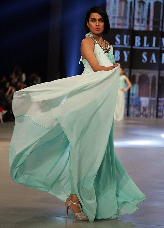 A model presents a creation by designer Sara during Fashion Week by the Pakistan Fashion Design Council in Lahore, Pakistan.