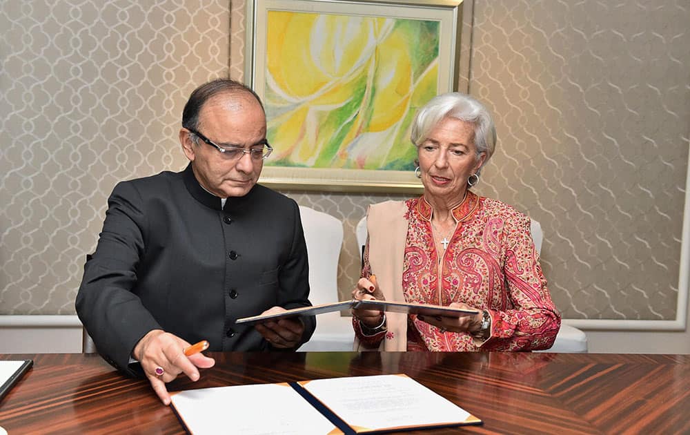 Finance Minister Arun Jaitley with International Monetary Fund Managing Director Christine Lagarde signing an MoU on the sidelines of the conference on Advancing Asia : Investing for the Future in New Delhi.