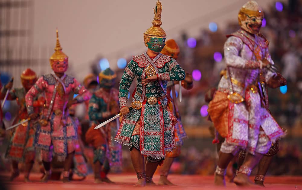 Artists from Thailand perform at a massive three-day cultural festival organized by the Art of Living Foundation on the banks of the river Yamuna in New Delhi.