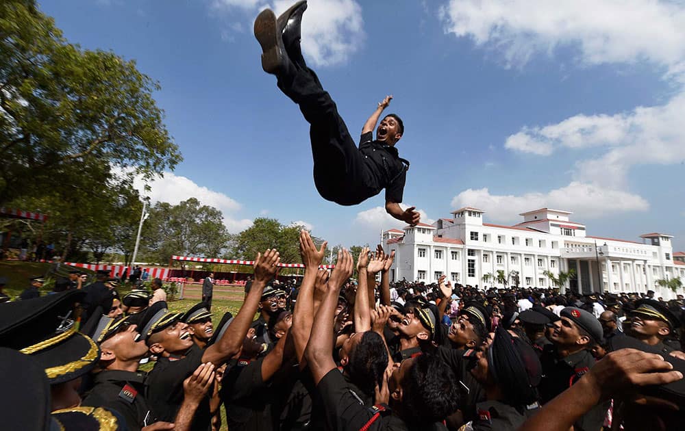 Newly commissioned officers jubilate after their passing out parade at the Officers Training Academy in Chennai.