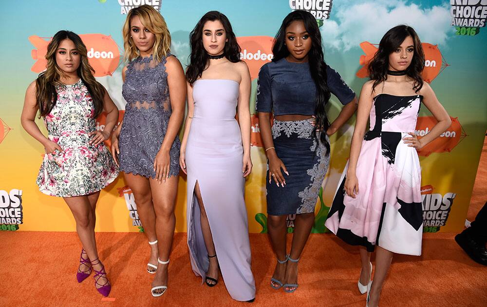 Ally Brooke, from left, Dinah Jane, Lauren Jauregui, Normani Kordei and Camila Cabello, of Fifth Harmony, arrive at the Kids' Choice Awards at The Forum in Inglewood, Calif.