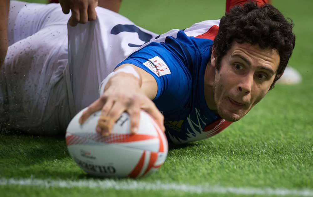 France's Manoel Dall Igna fails to score a try against Canada during World Rugby Sevens Series' Canada Sevens Bowl final action in Vancouver, Canada.
