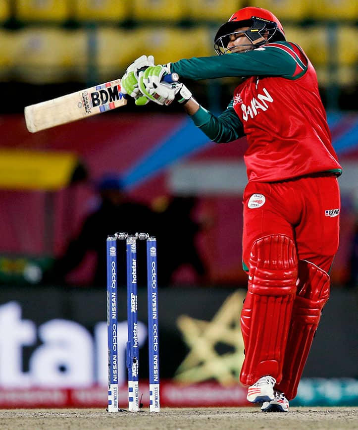 Oman's Aamir Kaleem plays a shot during the ICC World Twenty20 2016 cricket tournament against Bangladesh at the Himachal Pradesh Cricket Association (HPCA) stadium in Dharamsala.