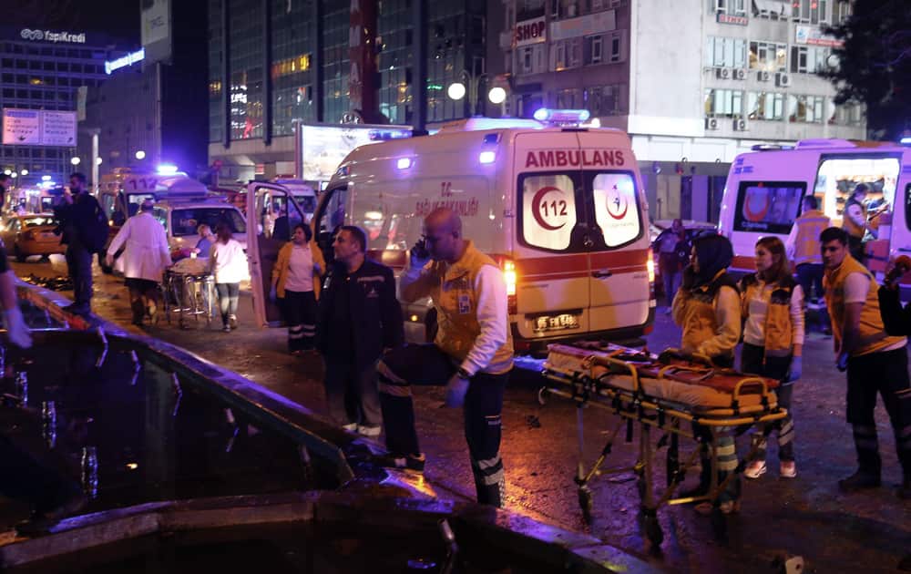 Emergency services work at the explosion site in the busy center of Turkish capital, Ankara. News reports say the large explosion in the capital has caused several deaths and many casualties. 