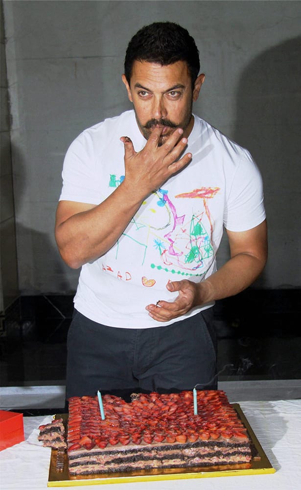 Actor Aamir Khan during his 51st birthday celebrations at his residence in Mumbai.