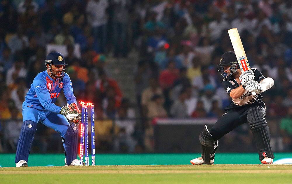 New Zealand's Kane Williamson is stumped by India's Mahendra Singh Dhoni during the ICC World Twenty20 2016 cricket match at the Vidarbha Cricket Association stadium in Nagpur.