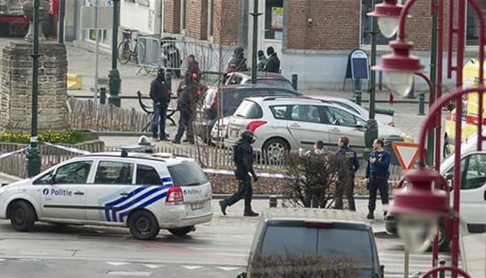 Manhunt in Brussels after raid linked to Paris attacks