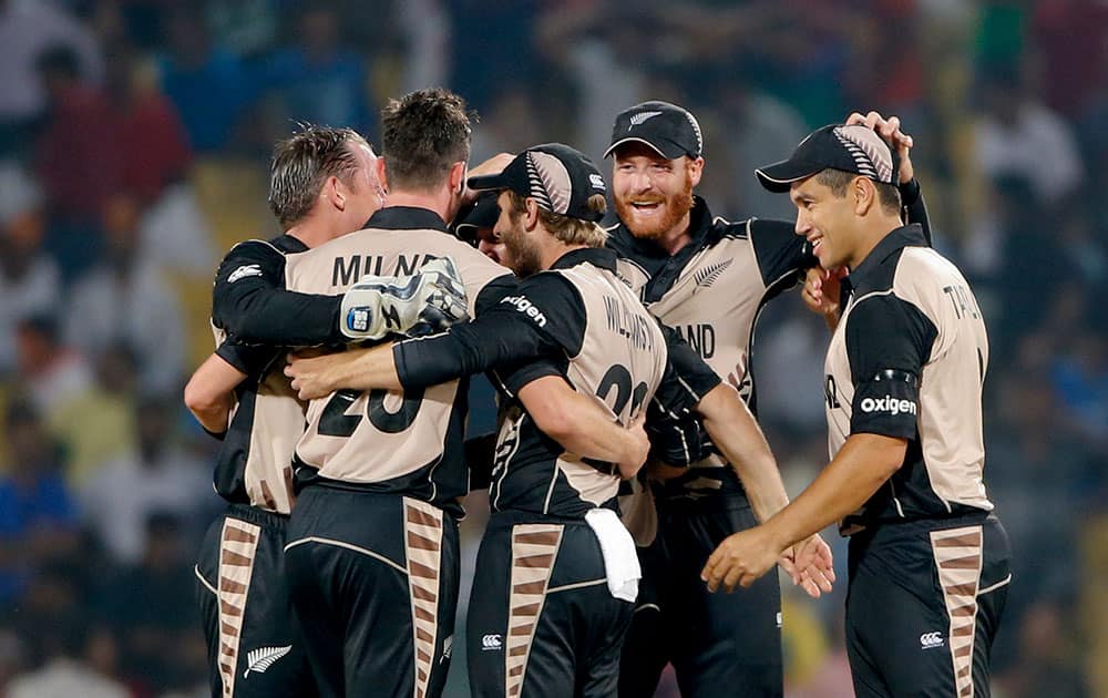 New Zealand players celebrate after defeating India by 47 runs during the ICC World Twenty20 2016 cricket match at the Vidarbha Cricket Association stadium in Nagpur.