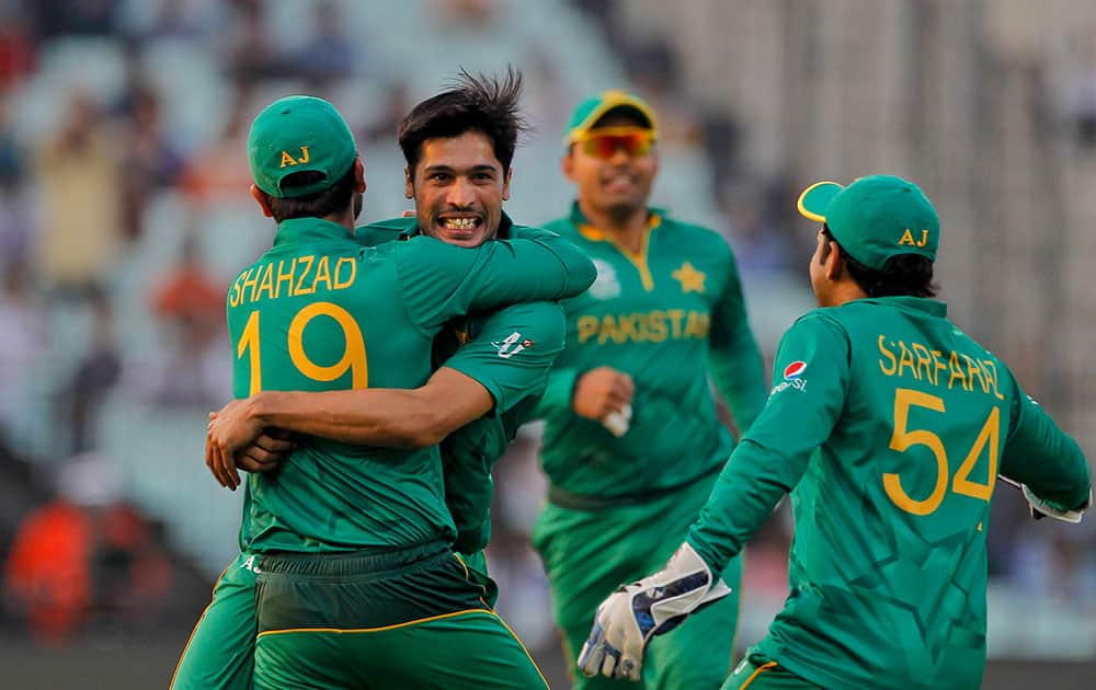 Pakistan's Mohammad Amir celebrates the wicket of Bangladesh's Soumya Sarkar during their ICC World Twenty20 2016 cricket match in Kolkata.