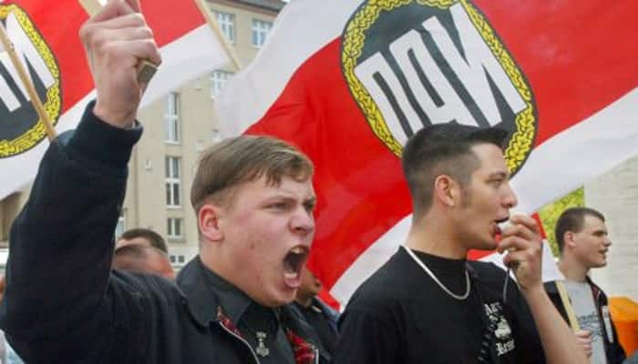 Germany bans neo-Nazi group, carries out sweeping raids