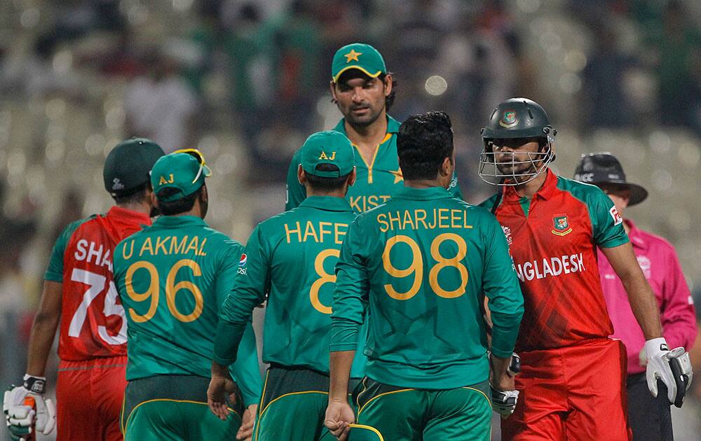 Bangladeshi batsmen Mashrafe Mortaza congratulate Pakistan players who won their ICC World Twenty20 2016 cricket match in Kolkata.