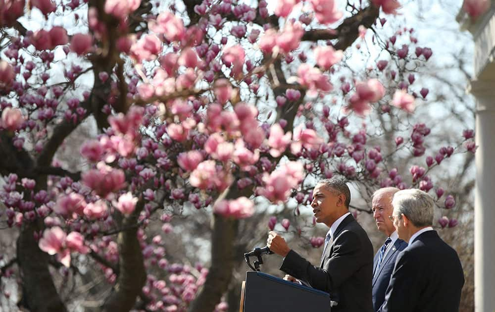 President Barack Obama and Vice President Joe Biden, center, introduce Federal appeals court judge Merrick Garland, right, as Obama’s nominee for the Supreme Court during an announcement in the Rose Garden of the White House, in Washington.