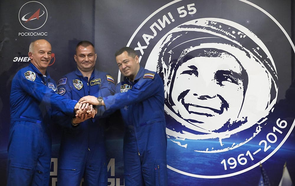 Members of the main crew to the International Space Station (ISS), from left: NASA astronaut Jeff Williams, Russian cosmonauts Alexei Ovchinin and Oleg Skripochka of Roscosmos, pose after a news conference in Russian leased Baikonur cosmodrome, Kazakhstan.