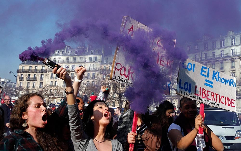 Students shout slogans during a demonstration in Paris.