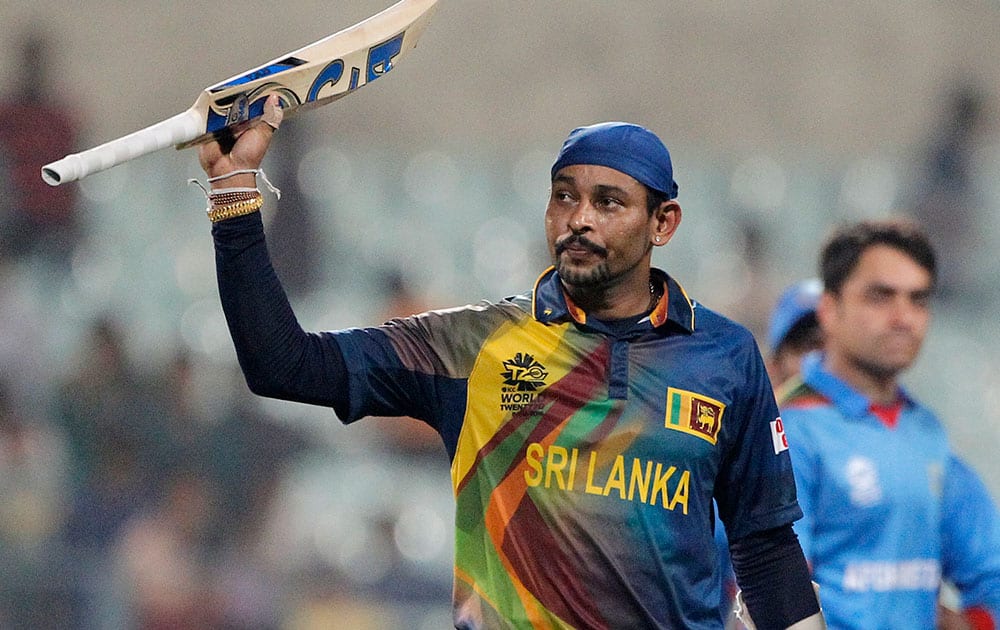 Sri Lanka's Tillakaratne Dilshan acknowledges the crowd after they defeated Afghanistan by six wickets in their ICC World Twenty20 2016 cricket match in Kolkata.