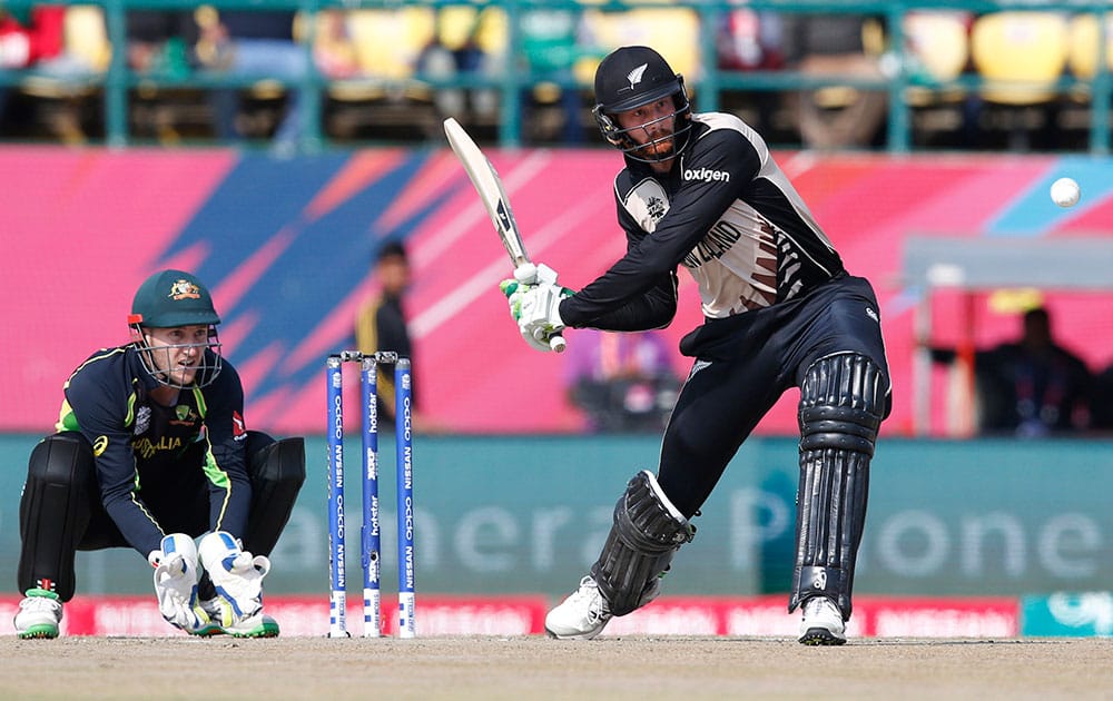 New Zealand's Martin Guptill hits a six against Australia during the ICC World Twenty20 2016 cricket tournament at the Himachal Pradesh Cricket Association (HPCA) stadium in Dharamsala.