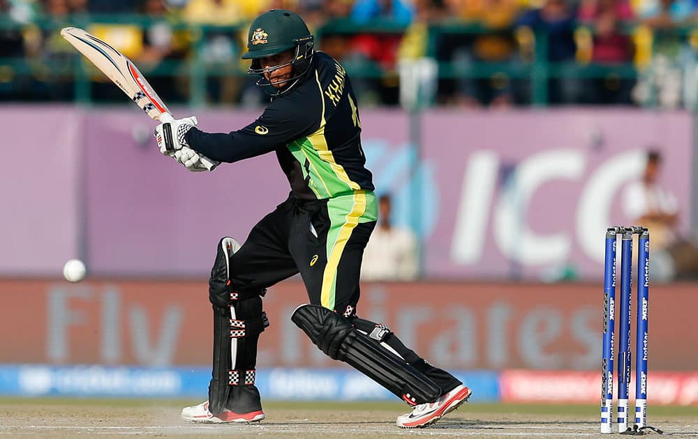 Australia's Usman Khawaja bats during their ICC World Twenty20 2016 cricket match against New Zealand at the Himachal Pradesh Cricket Association (HPCA) stadium in Dharamsala.