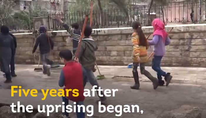 Sweeping change: Syrian kids on streets for a good cause - Video