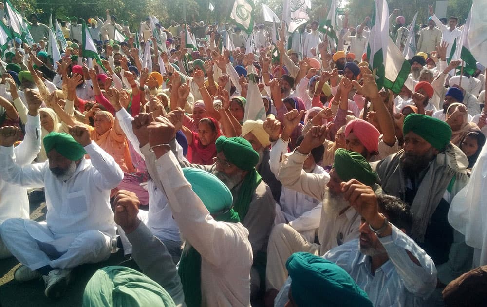 Farmers stage a demonstration voicing their demands in Mohali.