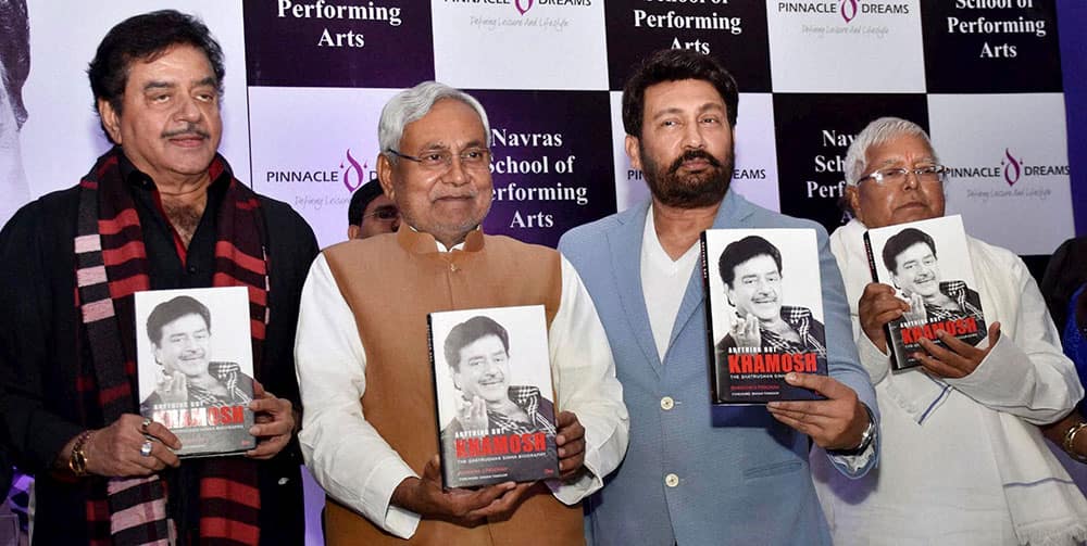 Bihar Chief Minister Nitish Kumar with RJD Chief Lalu Prasad and actor Sekhar Suman release the party MP Shatrughan Sinhas book Anything But Khamosh at a function in Patna.