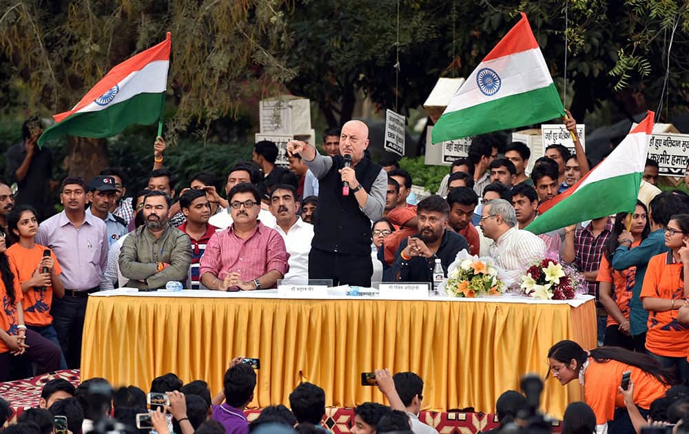 Bollywood actor Anupam Kher addresses the students before the screening of his film Buddha in a Traffic Jam at JNU in New Delhi.