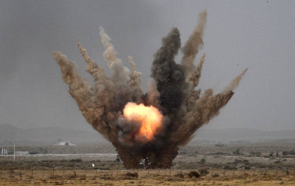 Air force aircraft hits a target during exercise 'Iron Fist' at Pokhran.