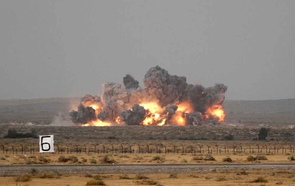 An Indian air force aircraft hits a target during exercise 'Iron Fist' at Pokhran.
