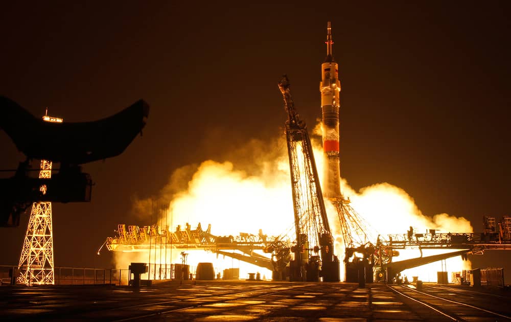 The Soyuz-FG rocket booster with Soyuz TMA-20M space ship carrying a new crew to the International Space Station, ISS, blasts off at the Russian leased Baikonur cosmodrome, Kazakhstan.