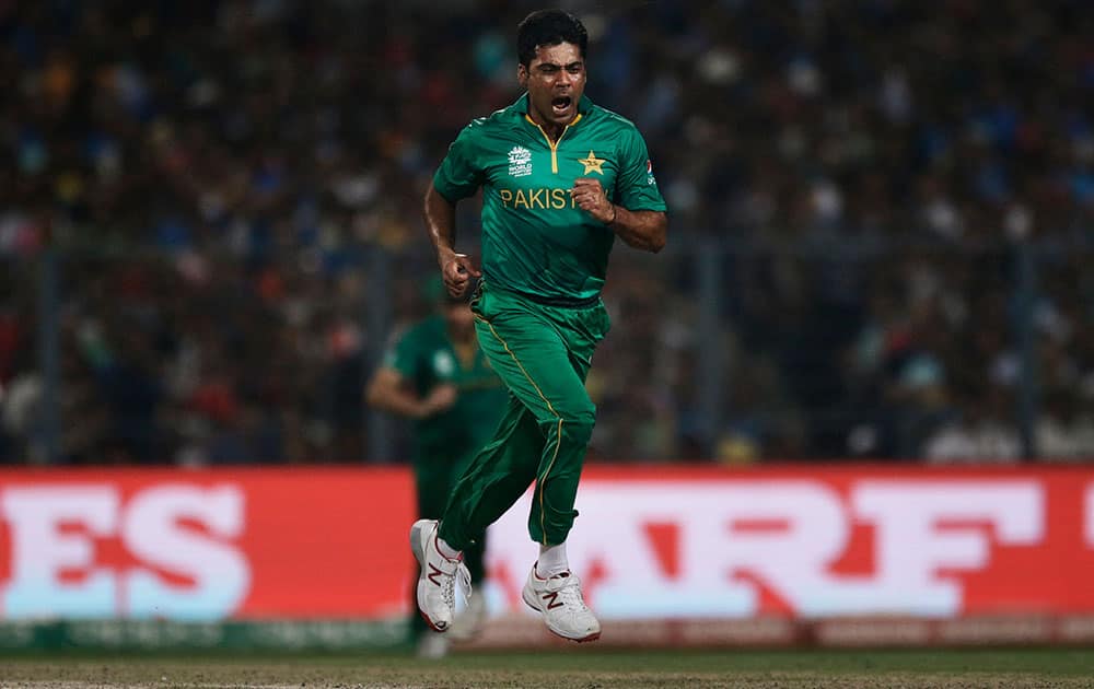 Pakistan's Mohammad Sami celebrates after winning a wicket against India during the ICC World Twenty20 2016 cricket match between India and Pakistan at Eden Gardens in Kolkota.