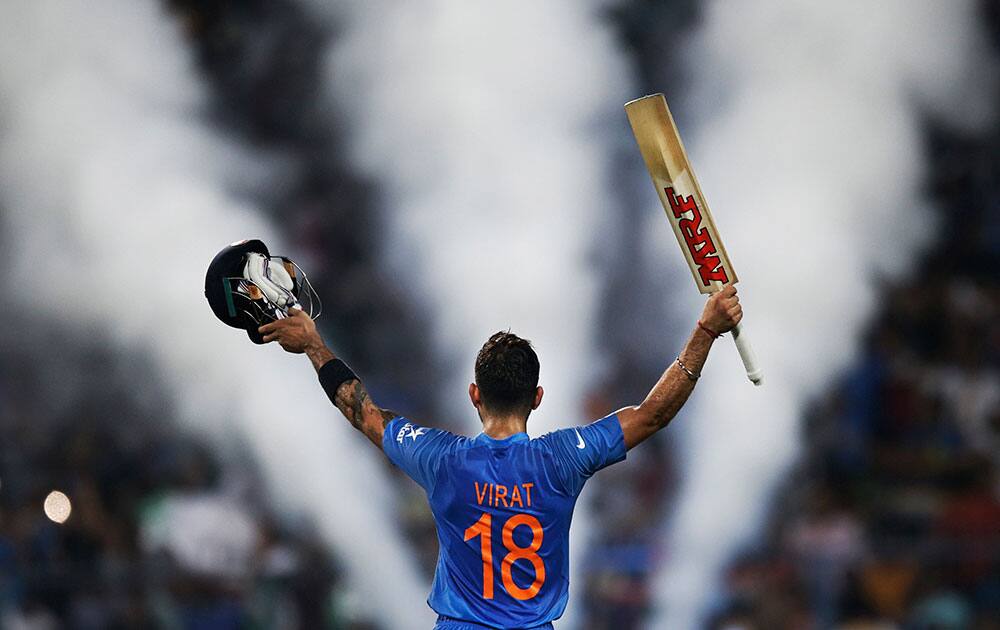 India's Virat Kohli celebrates his team victory during the ICC World Twenty20 2016 cricket match against Pakistan at Eden Gardens in Kolkata.