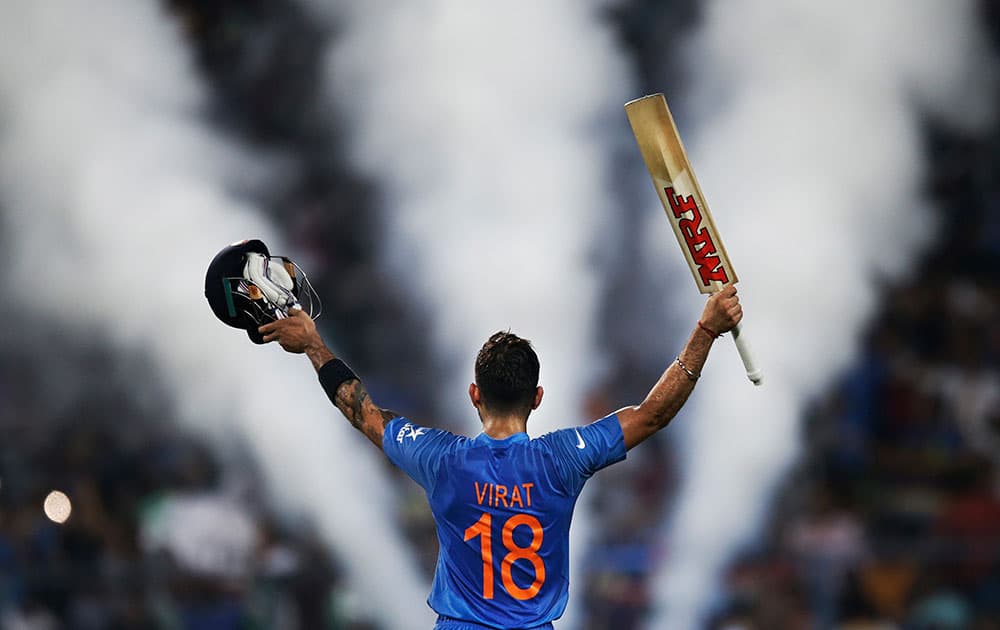 INDIA'S VIRAT KOHLI CELEBRATES HIS TEAM VICTORY DURING THE ICC WORLD TWENTY20 2016 CRICKET MATCH AGAINST PAKISTAN AT EDEN GARDENS IN KOLKATA.